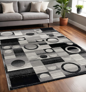 HomeRoots 10' Stylish Black Gray White Geometric Runner Rug - Durable Power Loom Design for High-Traffic Areas 5' X 7' 393970