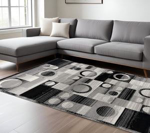 HomeRoots 10' Stylish Black Gray White Geometric Runner Rug - Durable Power Loom Design for High-Traffic Areas 6' X 9' 393971