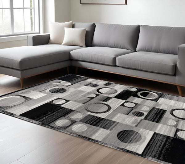 HomeRoots 10' Stylish Black Gray White Geometric Runner Rug - Durable Power Loom Design for High-Traffic Areas 8' X 10' 393972