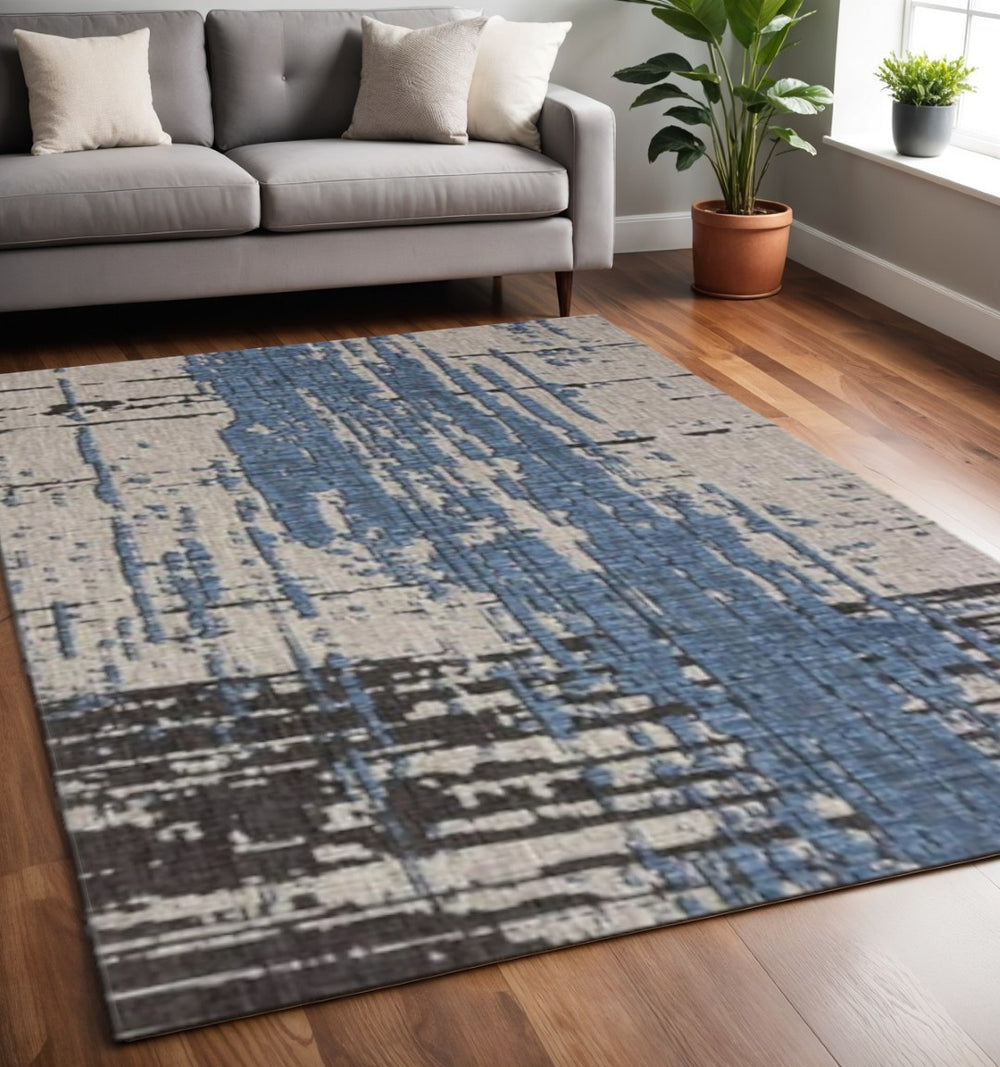 HomeRoots 5' Abstract Blue and Gray Area Rug - Modern Design for Living Rooms, Bedrooms, or Home Offices 5' X 7' 394092