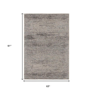HomeRoots 5' Blue and Gray Distressed Area Rug - Modern Abstract Design for Comfortable, Stylish Living Spaces 5' x 8' 394114