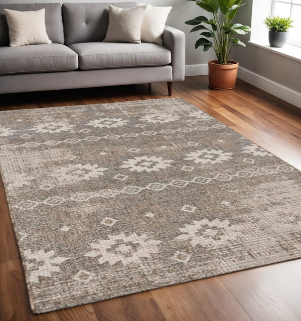 HomeRoots 10' Gray and Ivory Ikat Runner Rug - Stylish, Durable Design for Hallways, Kitchens, and Entryways 5' X 7' 394144