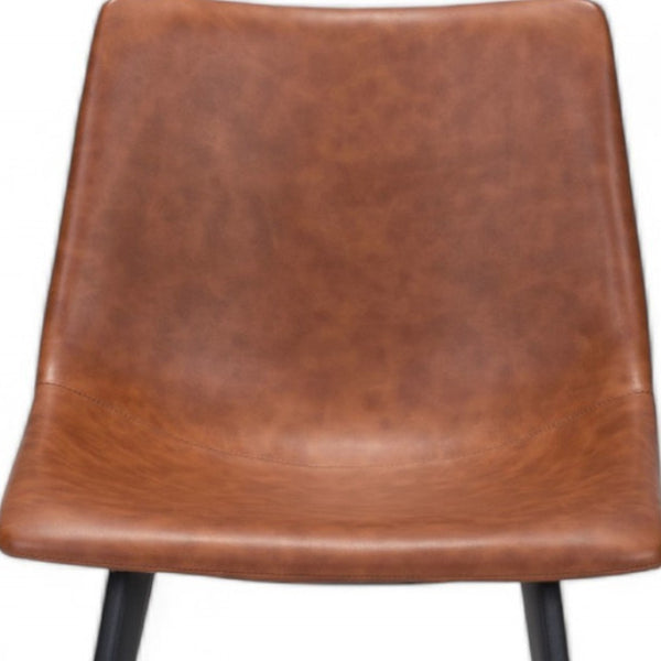 HomeRoots Set of Two Vintage Faux Leather Dining Chairs - Modern Industrial Style for Comfort & Versatility 394710