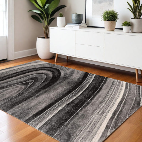 HomeRoots 4' Dark Gray Abstract Area Rug - Modern Illusional Design for Stylish Comfort and Durability 4' X 6' 394985