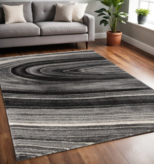 HomeRoots 4' Dark Gray Abstract Area Rug - Modern Illusional Design for Stylish Comfort and Durability 5' X 8' 394986