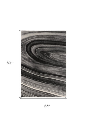 HomeRoots 4' Dark Gray Abstract Area Rug - Modern Illusional Design for Stylish Comfort and Durability 5' X 8' 394986