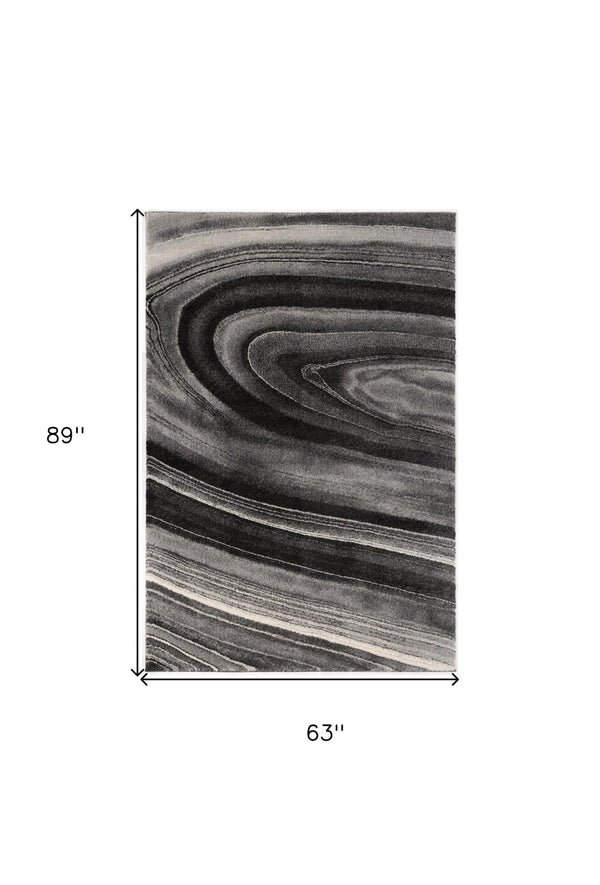 HomeRoots 4' Dark Gray Abstract Area Rug - Modern Illusional Design for Stylish Comfort and Durability 5' X 8' 394986