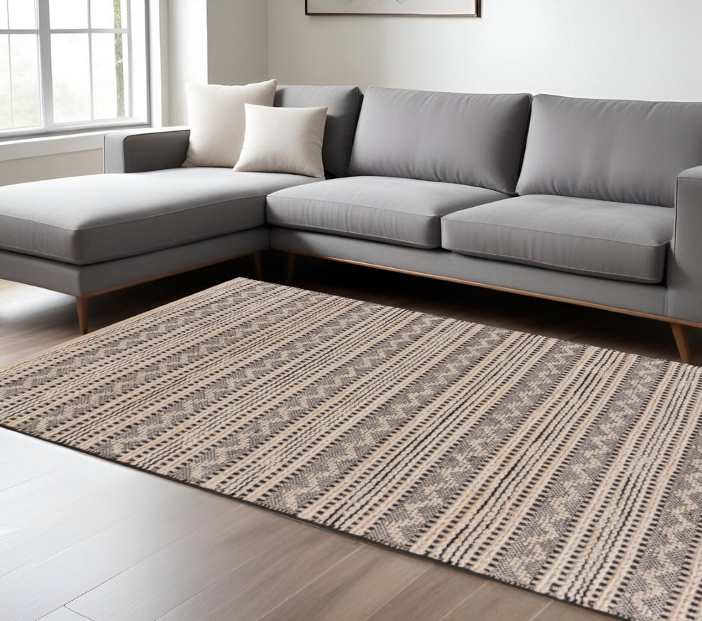HomeRoots 8' Black and Blush Chevron Stripe Area Rug - Hand-Loomed Elegance for Modern and Bohemian Spaces 8' X 10' 395488