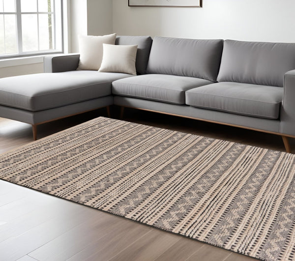 HomeRoots 8' Black and Blush Chevron Stripe Area Rug - Hand-Loomed Elegance for Modern and Bohemian Spaces 8' X 10' 395488