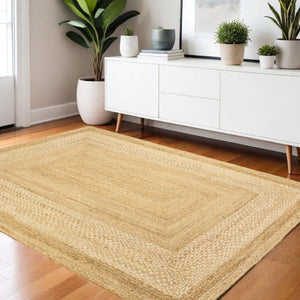 HomeRoots 4' Classic Tan Bordered Area Rug - Hand-Braided Jute, Timeless Charm for Any Home Décor Style 4' X 6' 395563