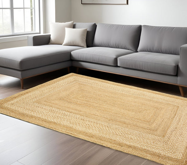 HomeRoots 4' Classic Tan Bordered Area Rug - Hand-Braided Jute, Timeless Charm for Any Home Décor Style 8' X 10' 395565
