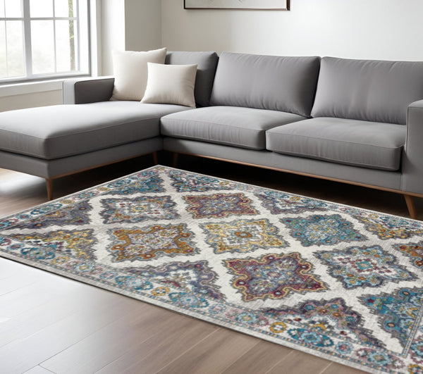 HomeRoots 8' Floral Elegance Area Rug - Traditional Motifs in Muted Blues, Browns, & Yellows for Any Room 8' X 10' 395718