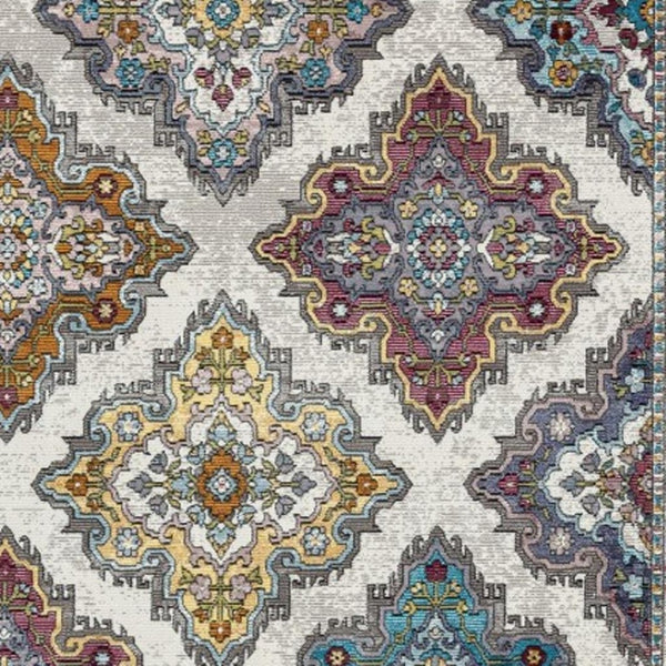 HomeRoots 8' Floral Elegance Area Rug - Traditional Motifs in Muted Blues, Browns, & Yellows for Any Room 8' X 10' 395718