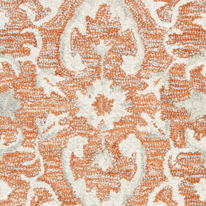 HomeRoots 9' Hand-Tufted Medallion Area Rug in Orange and Ivory - Elegant Comfort for Modern Living Spaces 9' X 12' 395916