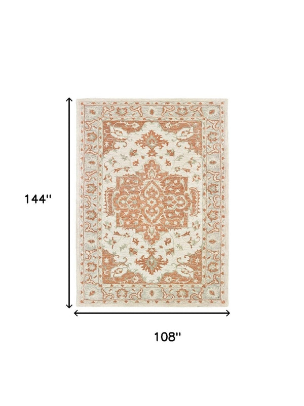 HomeRoots 9' Hand-Tufted Medallion Area Rug in Orange and Ivory - Elegant Comfort for Modern Living Spaces 9' X 12' 395916
