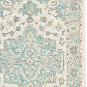 HomeRoots 5' Turquoise and Cream Medallion Area Rug - Plush, Hand-Tufted Wool Blend for Timeless Elegance 5' X 8' 395917