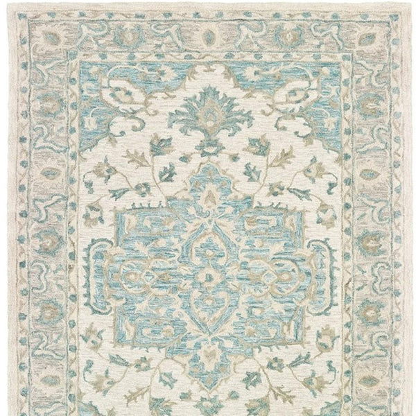 HomeRoots 8' Turquoise and Cream Medallion Area Rug - Hand-Tufted Elegance for Modern and Traditional Spaces 8' X 10' 395918