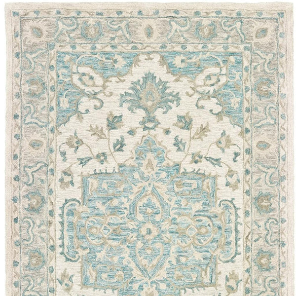 HomeRoots 8' Turquoise and Cream Medallion Area Rug - Hand-Tufted Elegance for Modern and Traditional Spaces 8' X 10' 395918