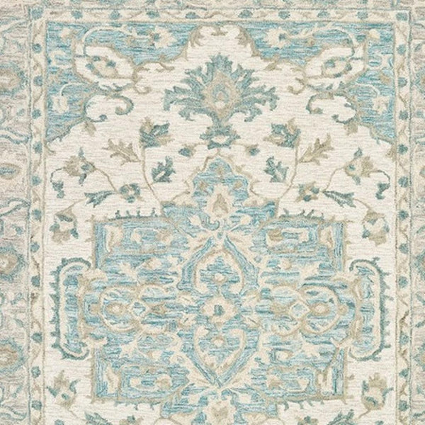 HomeRoots 8' Turquoise and Cream Medallion Area Rug - Hand-Tufted Elegance for Modern and Traditional Spaces 8' X 10' 395918