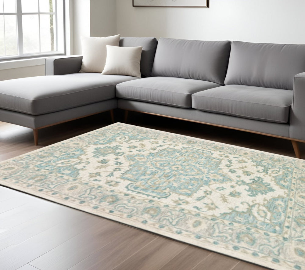 HomeRoots 8' Turquoise and Cream Medallion Area Rug - Hand-Tufted Elegance for Modern and Traditional Spaces 9' X 12' 395919