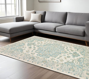 HomeRoots 8' Turquoise and Cream Medallion Area Rug - Hand-Tufted Elegance for Modern and Traditional Spaces 9' X 12' 395919