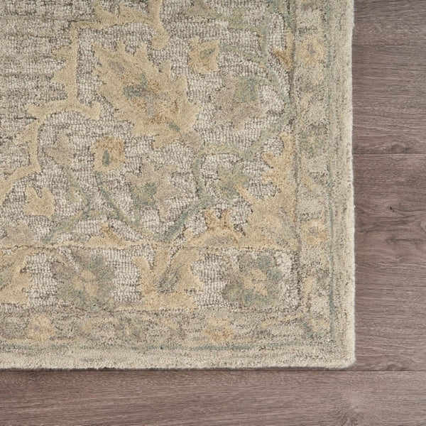 HomeRoots 9' Handwoven Beige Distressed Floral Area Rug - Vintage Charm for Living Rooms & Dining Spaces 9' X 12' 395925