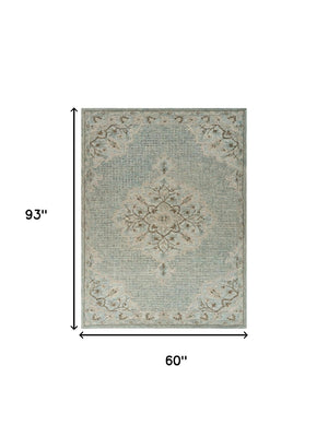 HomeRoots 5' Blue Wool Floral Medallion Hand-Tufted Area Rug - Artisan Crafted, Soft & Durable for Any Room 5' X 8' 395926