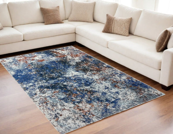 HomeRoots 5' Blue and White Abstract Ocean Area Rug - Modern Coastal Design for Stylish Interiors and Comfort 5' X 8' 395932