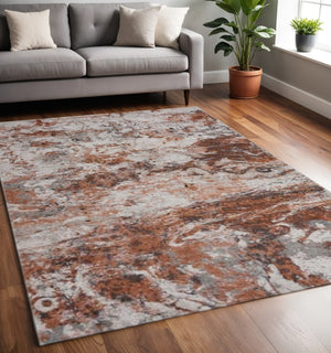 HomeRoots 5' Brown and White Abstract Earth Area Rug – Modern Artistry, Durable, Stain-Resistant Design for Any Room 5' x 8' 395938