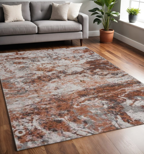 HomeRoots 5' Brown and White Abstract Earth Area Rug – Modern Artistry, Durable, Stain-Resistant Design for Any Room 5' x 8' 395938