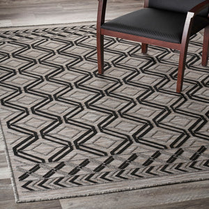 Homeroots 5' X 7' Black And Tan Indoor Outdoor Area Rug  Polypropylene 395973