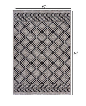 Homeroots 5' X 7' Black And Tan Indoor Outdoor Area Rug  Polypropylene 395973