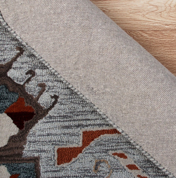 HomeRoots 4' Terracotta Tribal Area Rug - Hand-Tufted Wool with Geometric Motifs for Global-Inspired Style 4' Round 396190