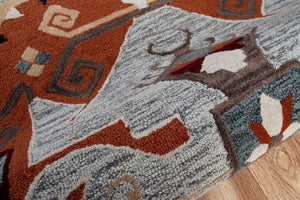 HomeRoots 4' Terracotta Tribal Area Rug - Hand-Tufted Wool with Geometric Motifs for Global-Inspired Style 4' Round 396190