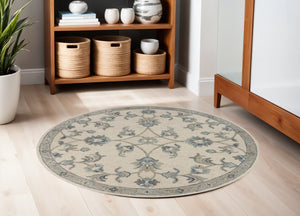 HomeRoots 5' Green Wool Hand-Tufted Rug - Timeless Elegance for Any Space, Durable, Soft, and Artisan Crafted 5' Round Round 396273