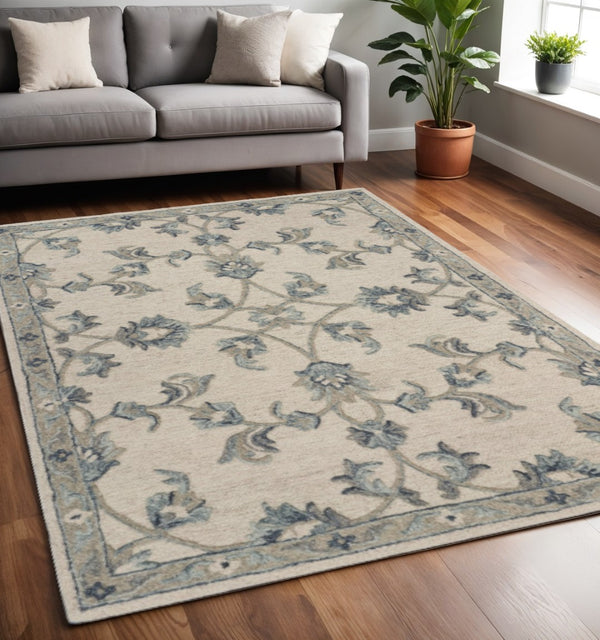 HomeRoots 5' Green Wool Hand-Tufted Rug - Timeless Elegance for Any Space, Durable, Soft, and Artisan Crafted 5' X 7' Rectangle 396274