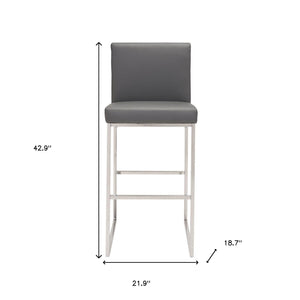 Homeroots 31" Gray And Silver Faux Leather And Steel Low Back Bar Height Bar Chair   396335