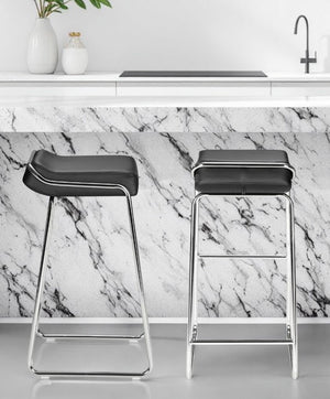 Homeroots Set Of Two 32" Black And Silver Faux Leather And Steel Backless Bar Height Bar Chairs   396350