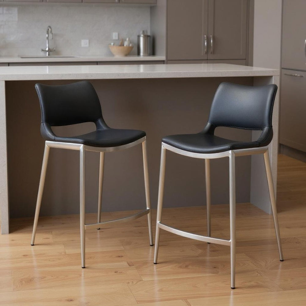 HomeRoots Set of Two Modern 25" Black Faux Leather Bar Chairs with Silver Steel Frame for Stylish Comfort 396488