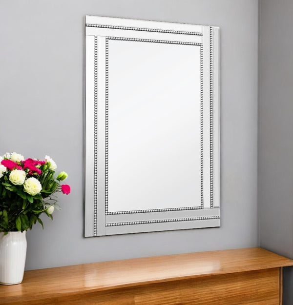HomeRoots 36" Silver Glass Framed Accent Mirror - Modern Elegance, Versatile Design for Any Room's Décor! 396581