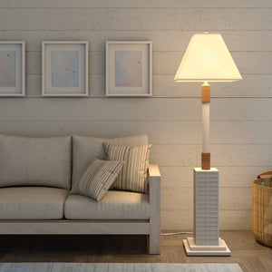 HomeRoots 63" Elegant White Polyresin Floor Lamp with Linen Shade for Warm Ambient Lighting in Any Room 397360