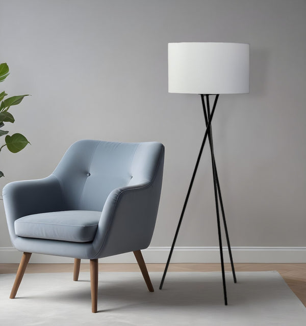 HomeRoots 66" Modern Black Tripod Floor Lamp with White Drum Shade - Versatile Lighting for Home & Office 397600