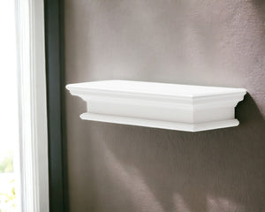 HomeRoots 23" Classic White Floating Wall Shelf - Elegant Display Solution for Photos, Plants, and Decor Items 397787