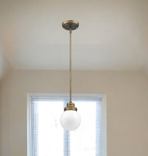 Homeroots Brushed Gold Metal Hanging With Round Glass Shade   398205