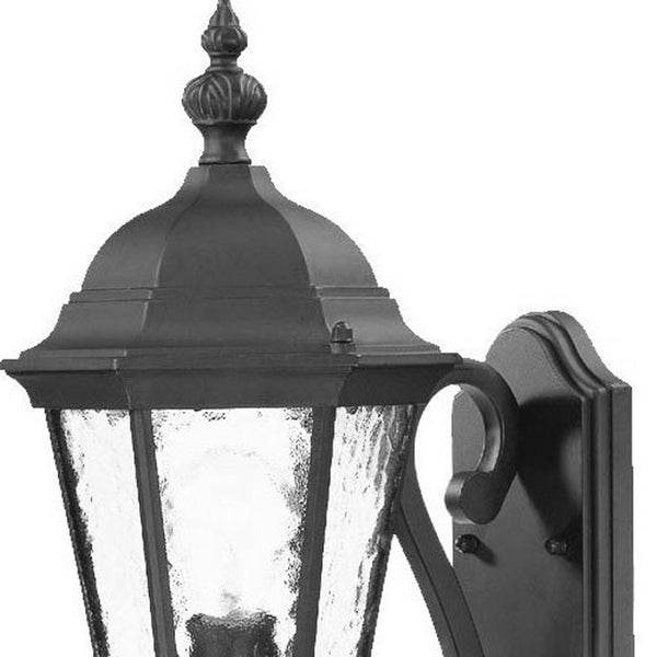 HomeRoots One Light Matte Black Carousel Lantern Wall Light - Timeless Outdoor Fixture with Hammered Glass Charm 398609