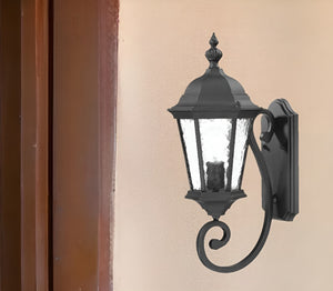 HomeRoots One Light Matte Black Carousel Lantern Wall Light - Timeless Outdoor Fixture with Hammered Glass Charm 398609