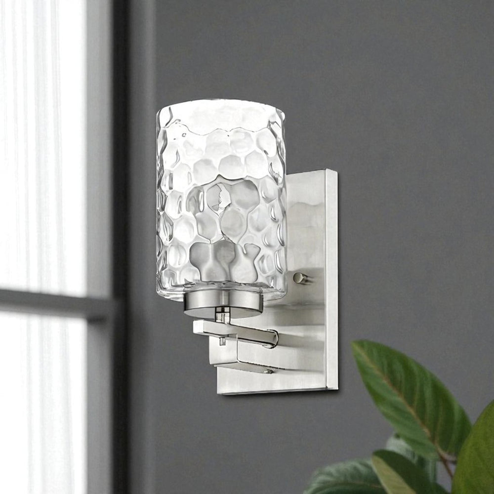 HomeRoots Silver Metal Wall Sconce with Pebbled Glass Shade - Modern Accent Lighting for Any Room Decor 398658