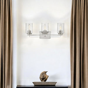 HomeRoots Silver Three-Light Wall Sconce with Textured Glass Shades for Modern Hallways, Kitchens & Living Rooms 398693
