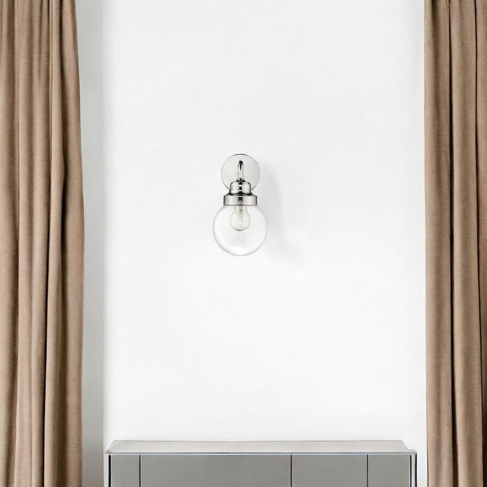 HomeRoots One Light Silver Wall Sconce - Elegant Round Glass Shade for Modern & Classic Home Decor Lighting 398699