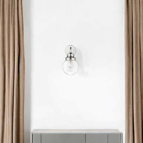 HomeRoots One Light Silver Wall Sconce - Elegant Round Glass Shade for Modern & Classic Home Decor Lighting 398699